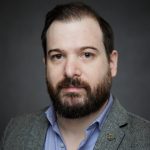 headshot of Joel Lorenzatti