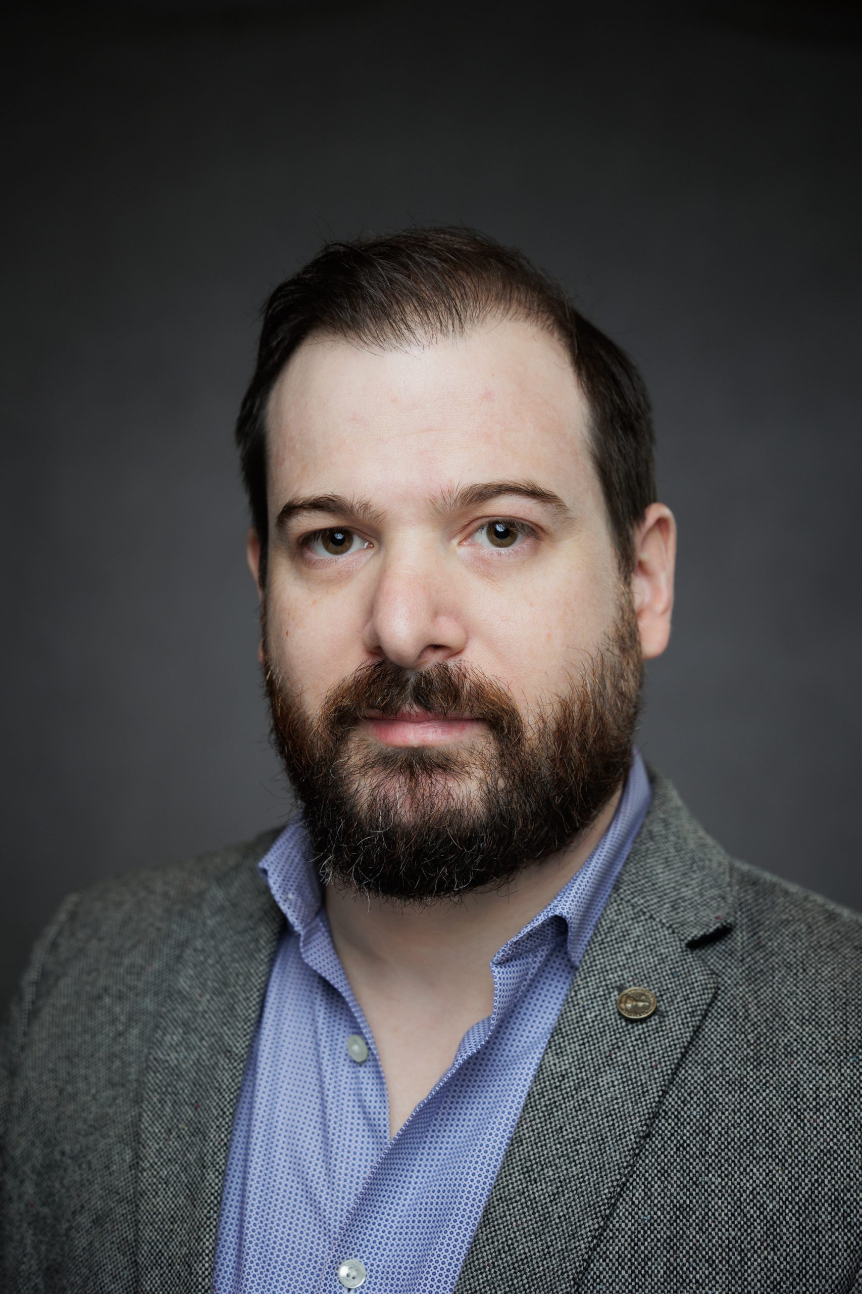 headshot of Joel Lorenzatti